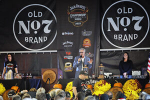 A speaker addresses the crowd at the 2025 Jack Daniel's World Championship BBQ.